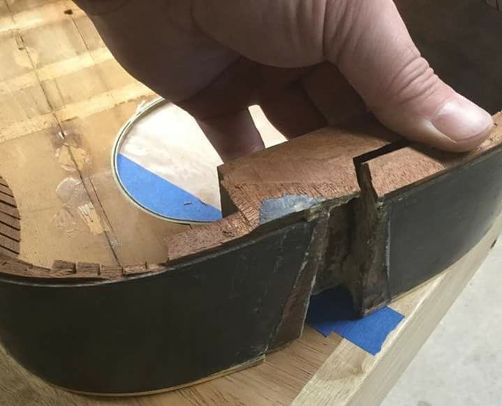 Robert Brooks repairing guitar