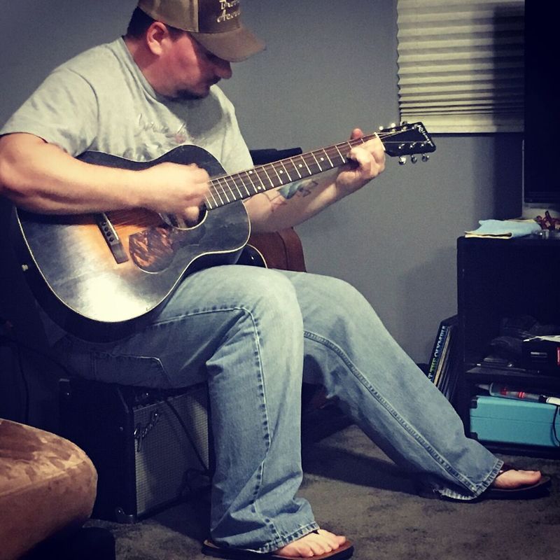 Robert Brooks Playing Guitar